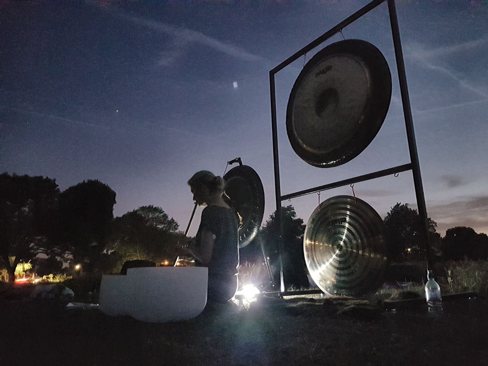 Restorative candle-lit gong bath