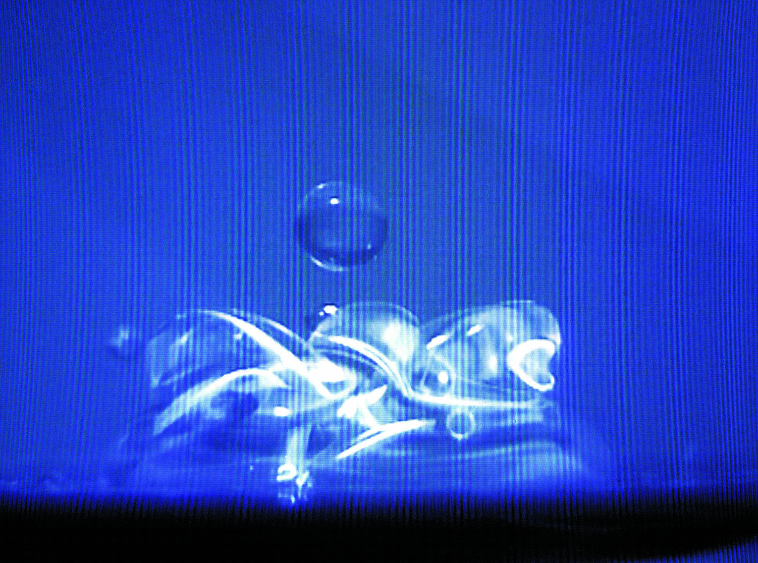 Illuminating Water with Sound