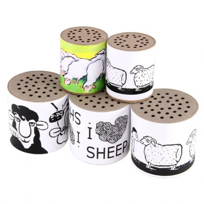 Five sheep noise-maker toys - small cylinders that 'baa' when turned over. 